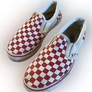 Red checkerboard slip on vans